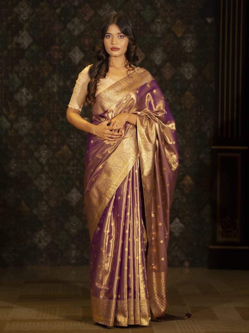 Party Wear Katan Saree Hand Crafted And Designed in Glamourous Golden And Purple Color