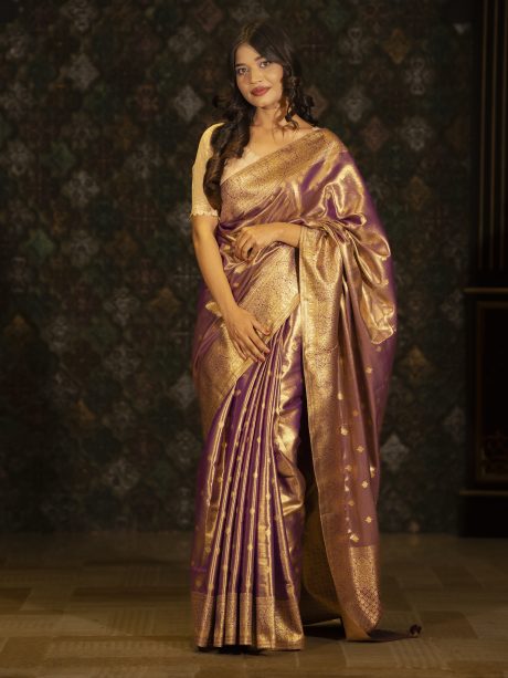Party Wear Katan Saree Hand Crafted And Designed in Glamourous Golden And Purple Color