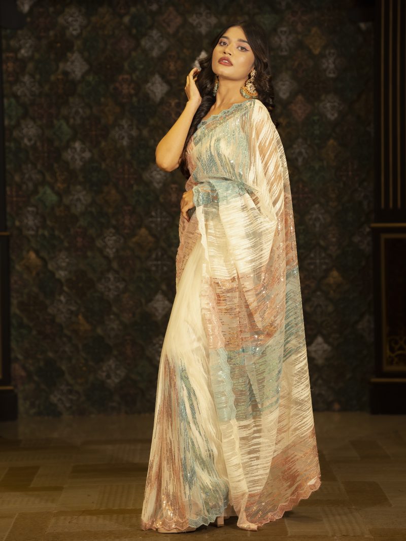 Splendid Off White Party Wear Net Saree Crafted With Sequence Work